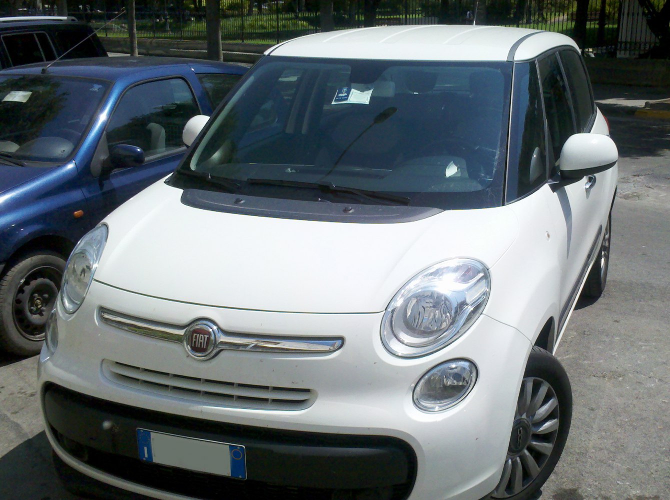 Front view of compact crossover with oval headlights and rounded design