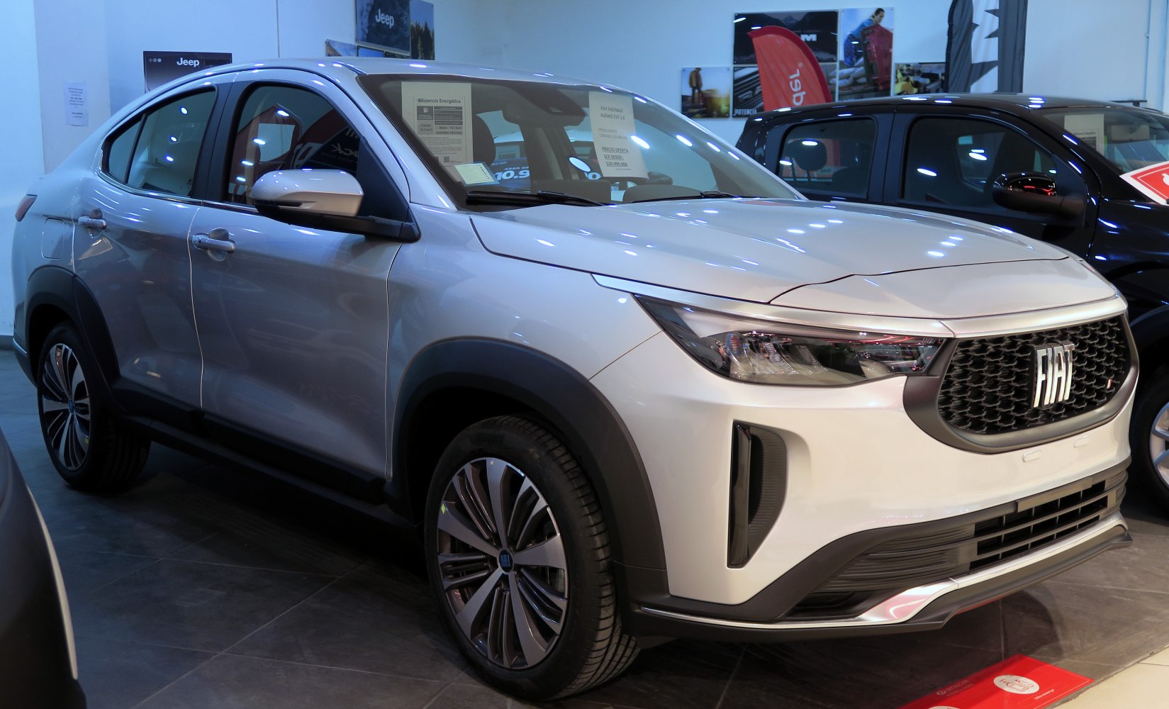 Front grille and sleek headlights on aerodynamic SUV body