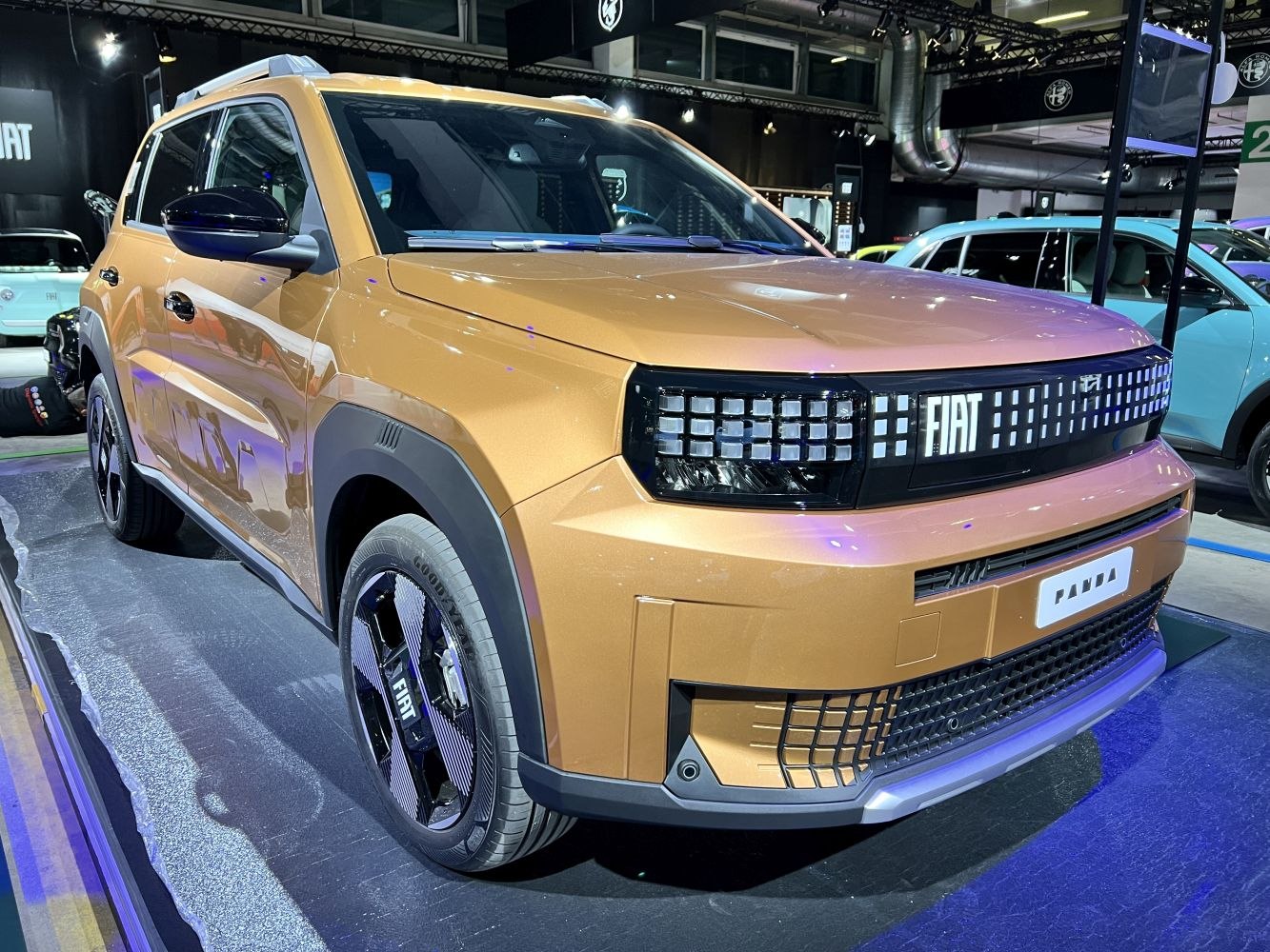 Futuristic front exterior with pixelated grille and modern headlights