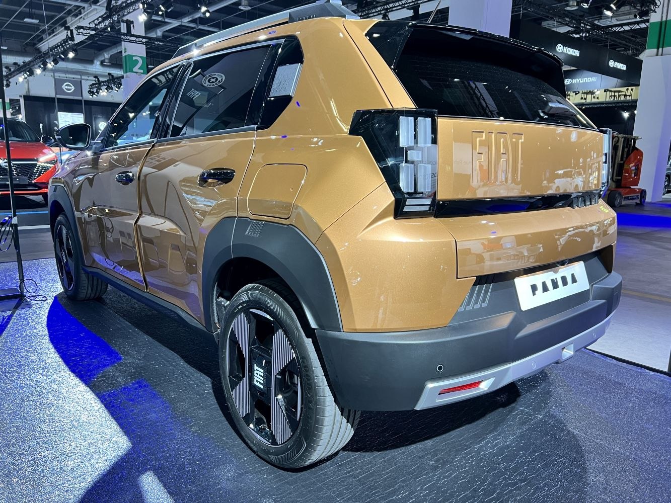 Rear side view of vehicle with modern taillights and distinctive styling