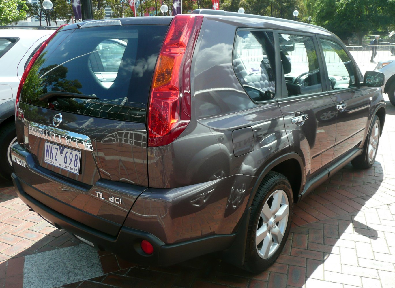 Rear and side view of SUV with vertical tail lights and five-door layout