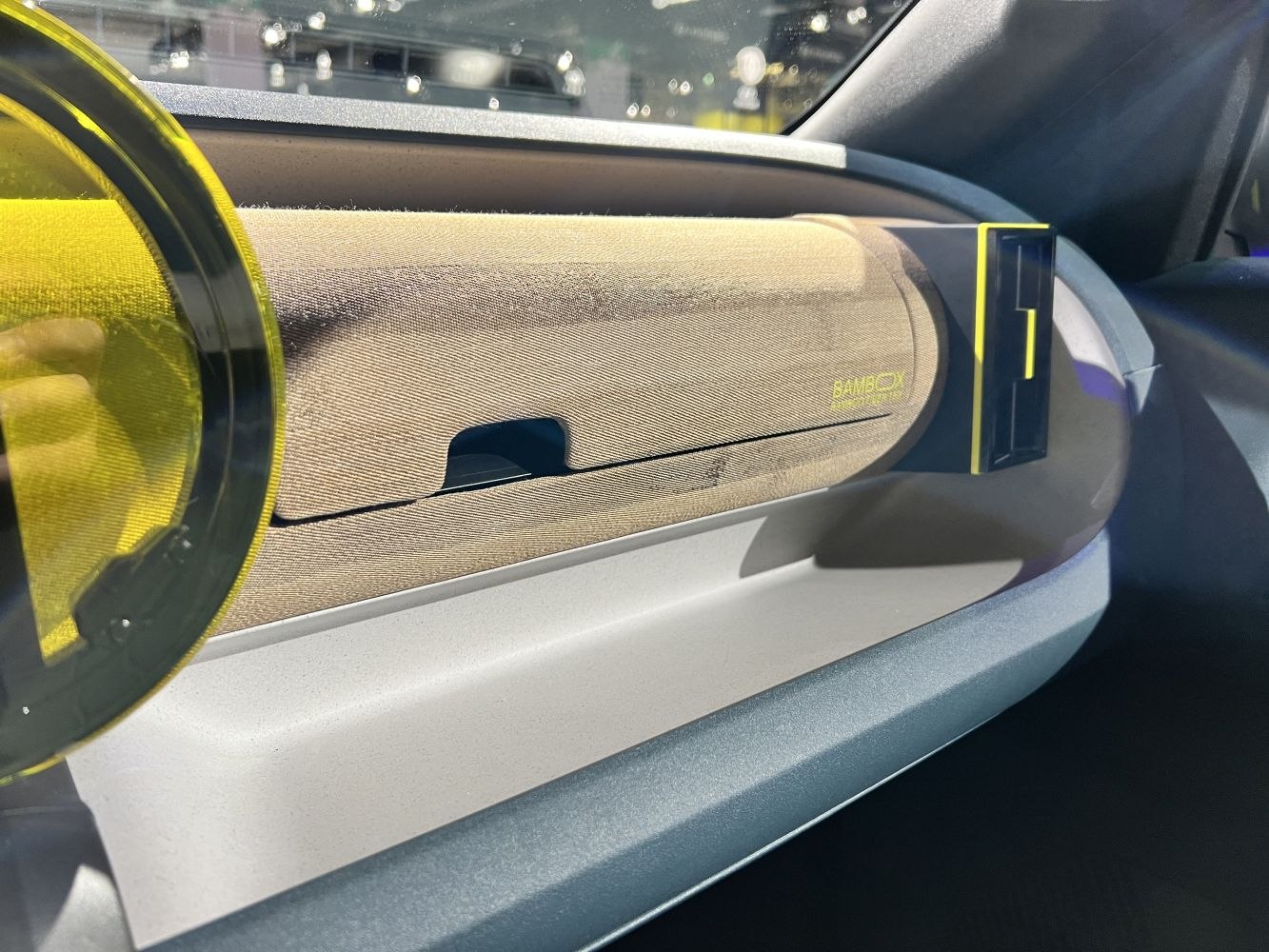 Glovebox with textured fabric and yellow accent trim