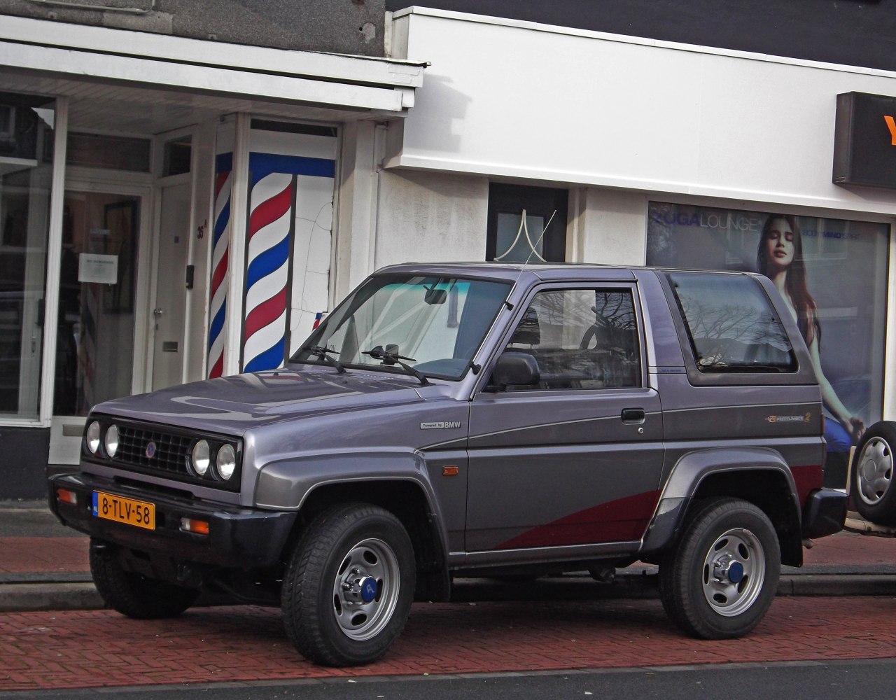 Compact SUV with 4-round headlights and two-door design