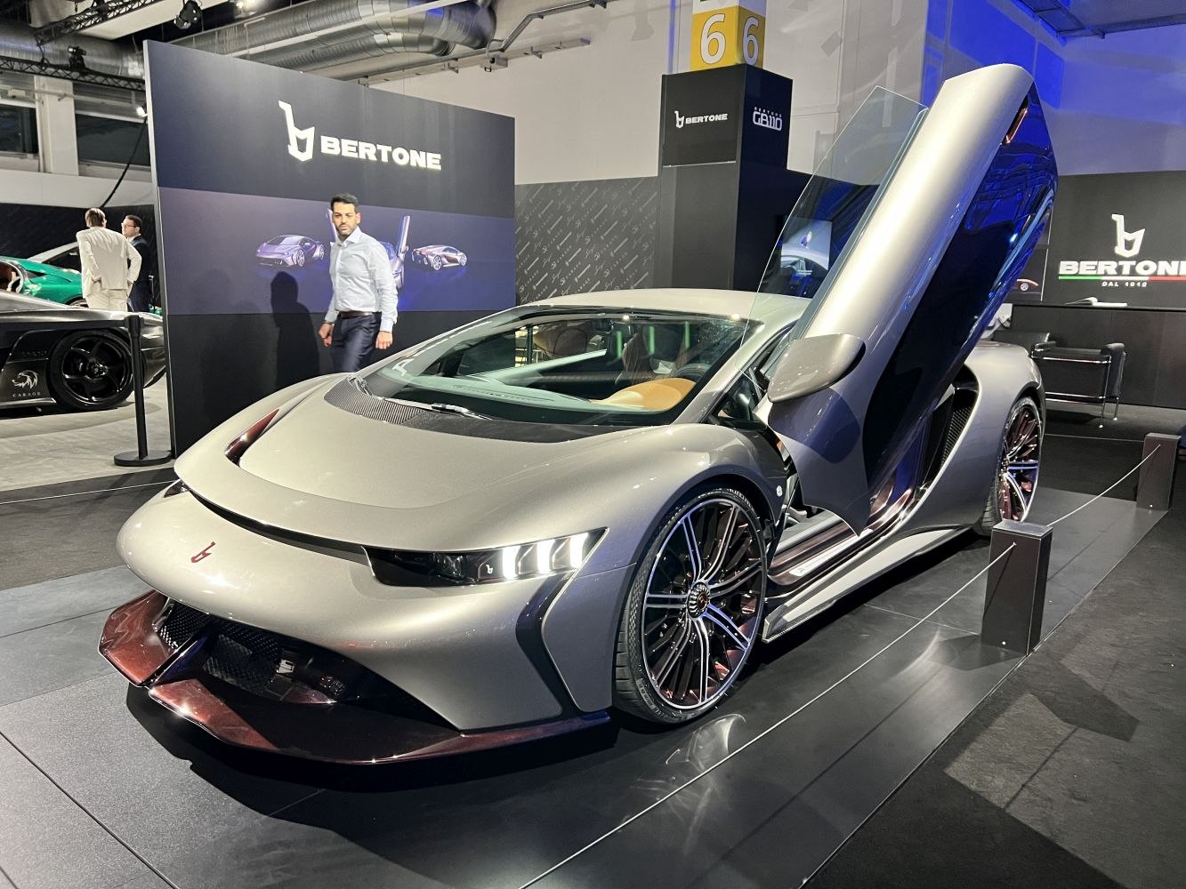Luxury sports car with iconic scissor doors and sleek aerodynamic body
