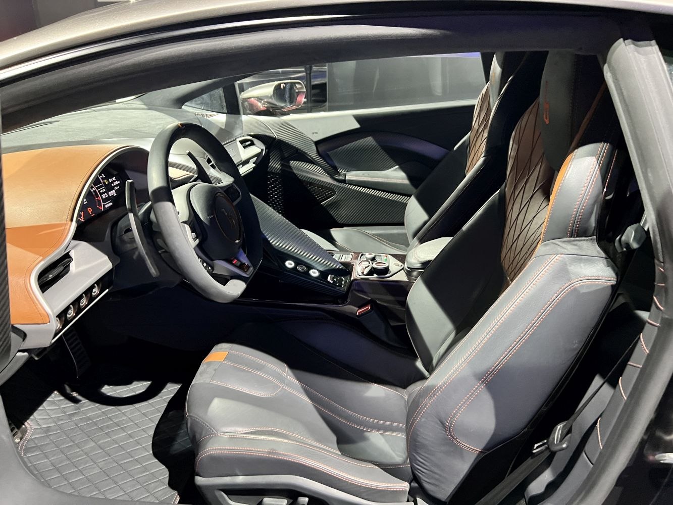 Premium leather seats and modern dashboard with carbon trim