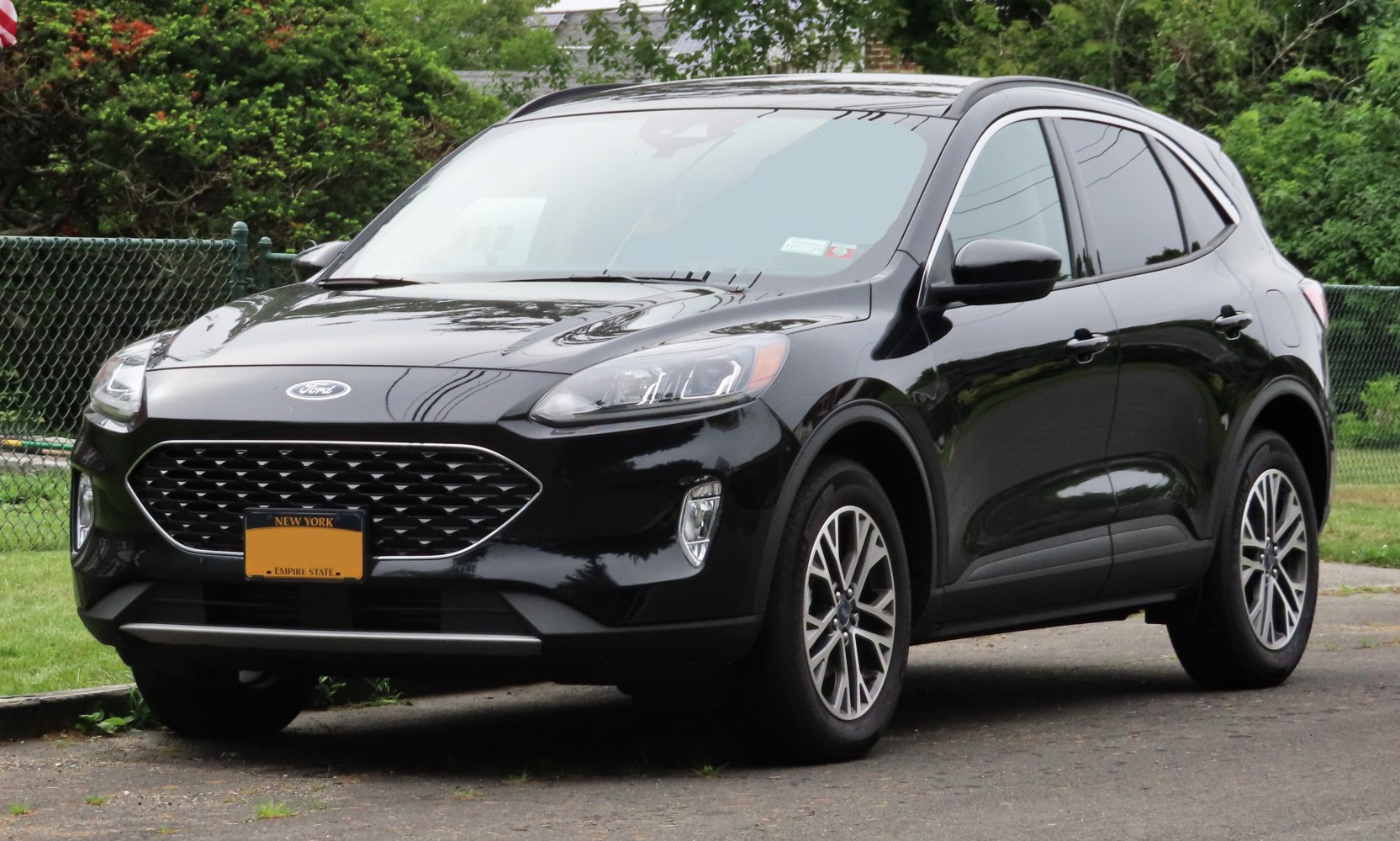 Bold front grille and LED headlights on a sleek SUV front.