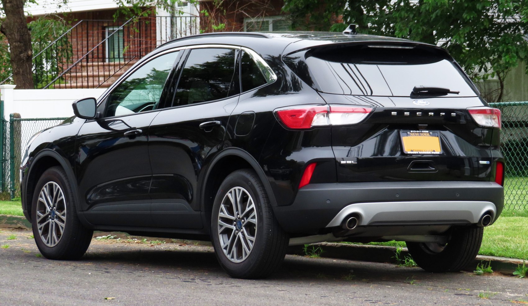 Compact SUV rear view with dual exhaust and alloy wheels