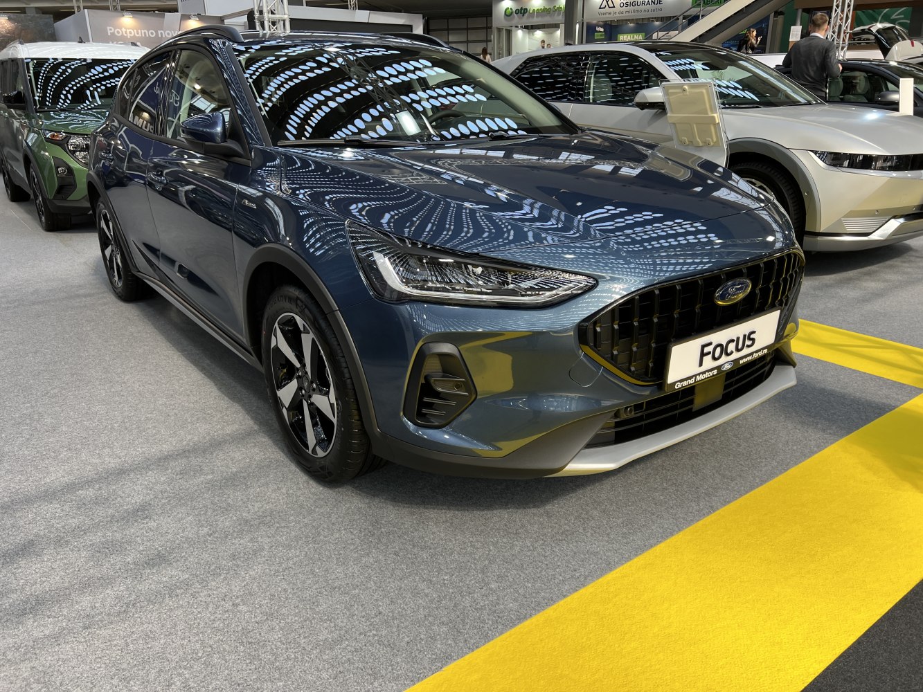 Front grille and headlights of a modern hatchback car