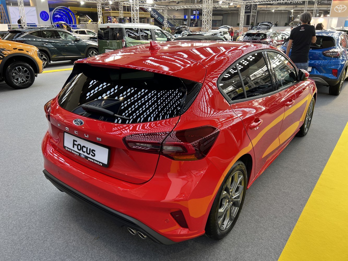 Rear view and dual exhaust of sporty hatchback