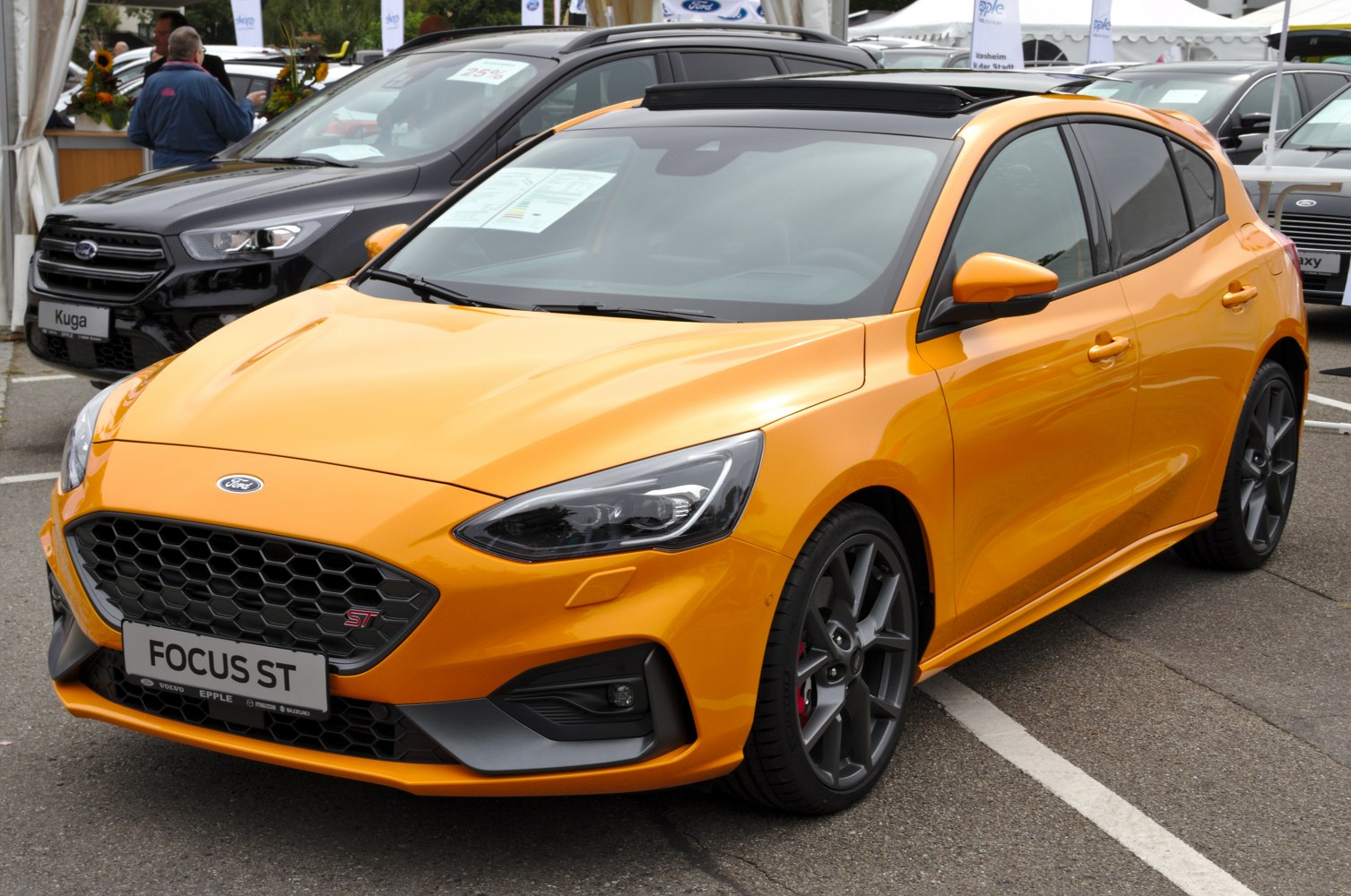 Sporty hatchback with aggressive grille and sleek side profile