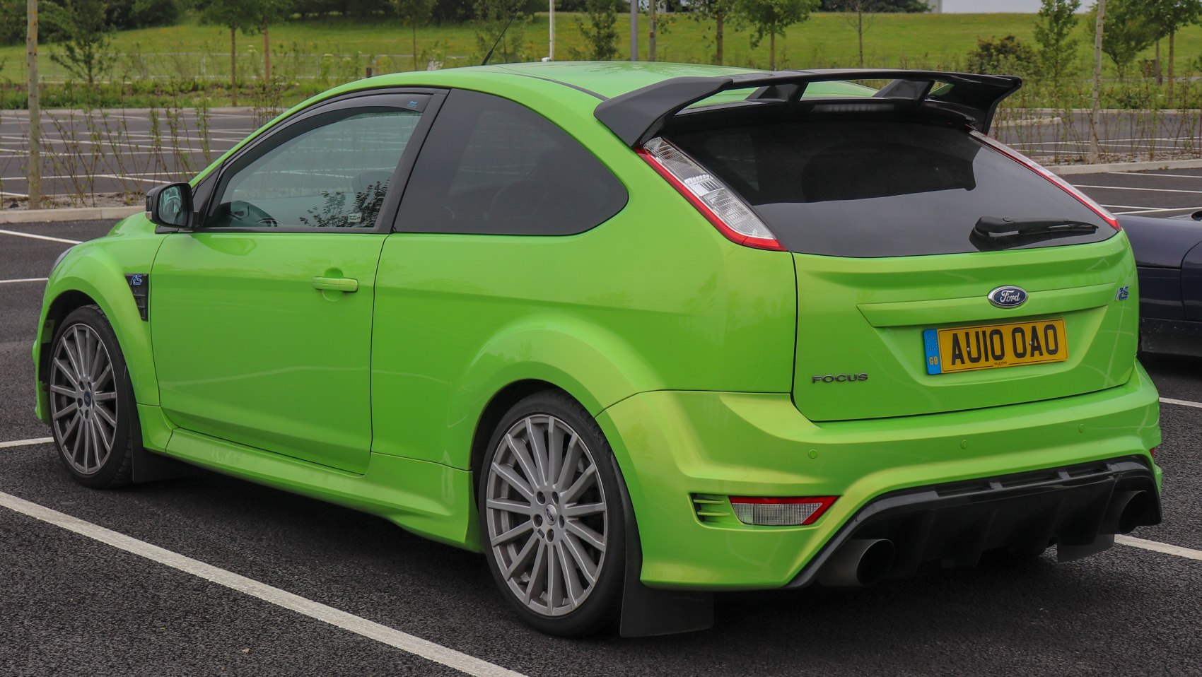 Sporty rear hatchback with spoiler and alloy wheels