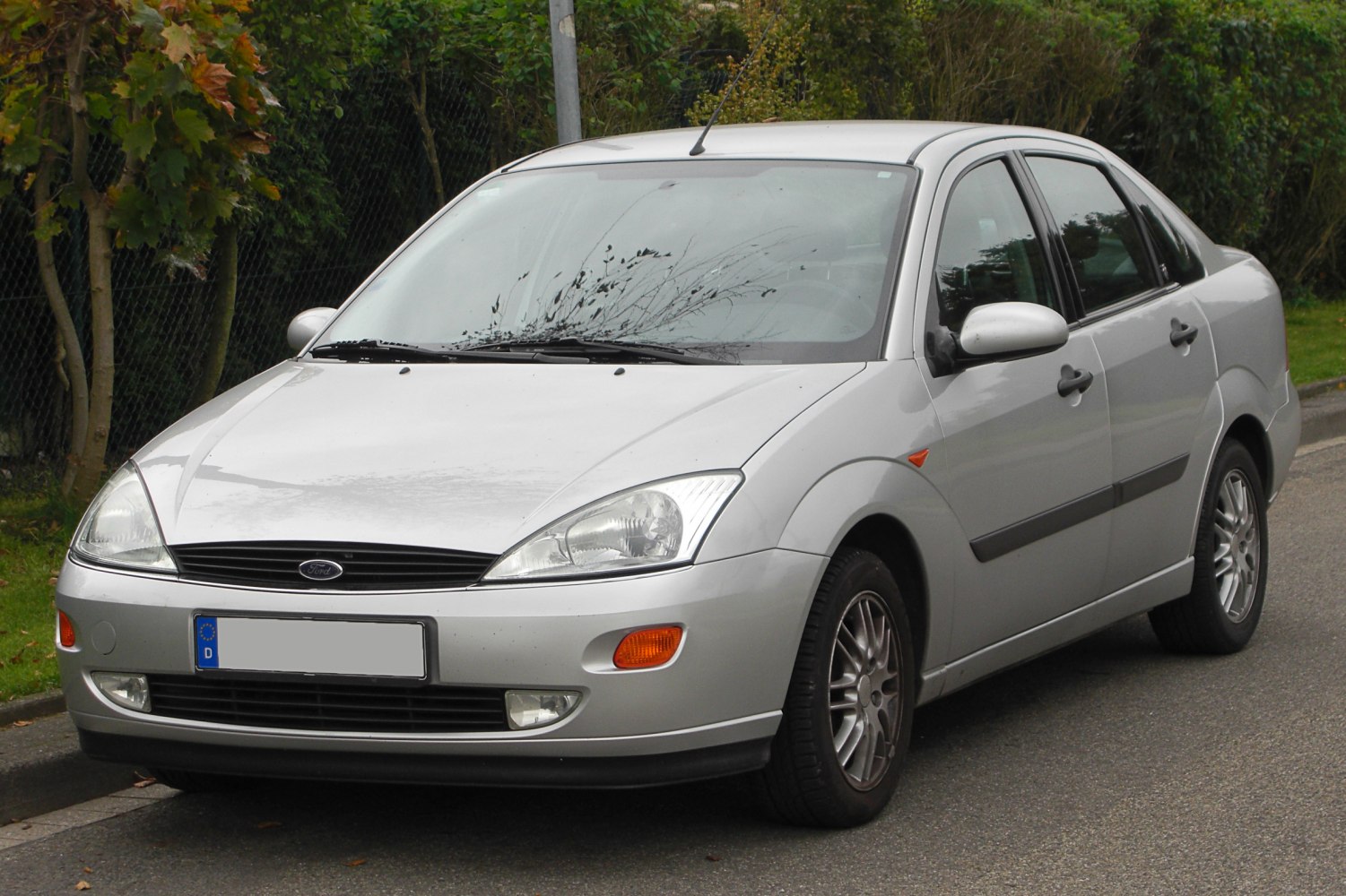 Silver sedan with aerodynamic lines and alloy wheels