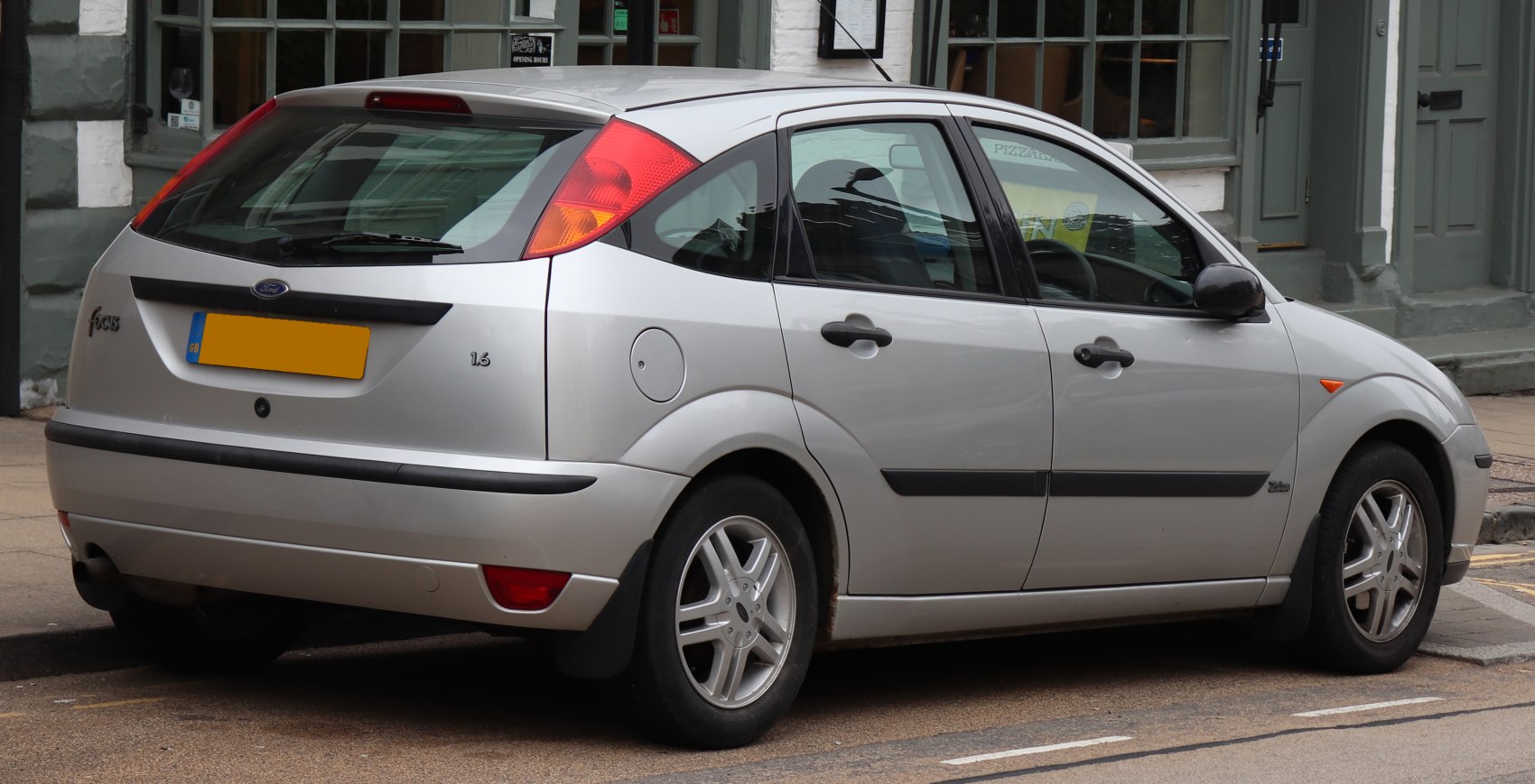 Silver hatchback rear and side profile with distinct tail lights