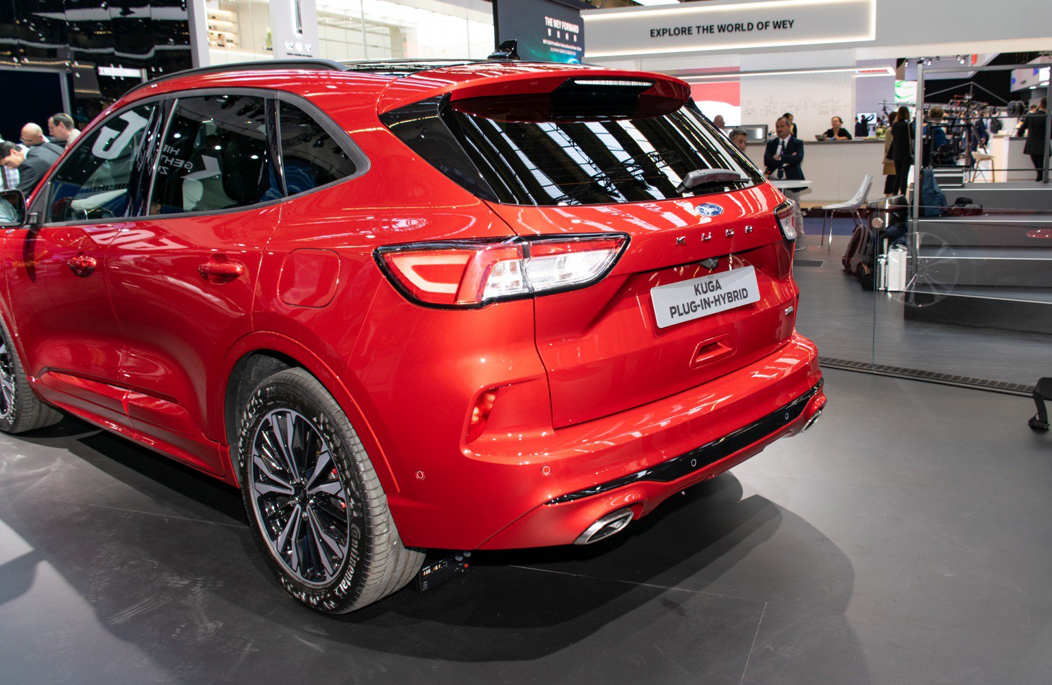 Red SUV rear view with LED taillights and sporty alloy wheels