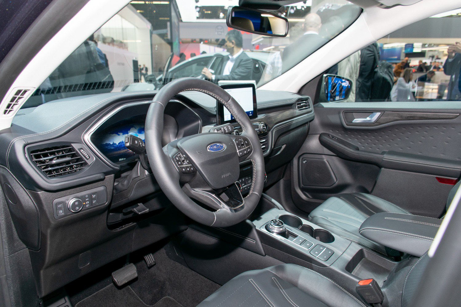 Modern steering wheel and dashboard with touchscreen and digital display