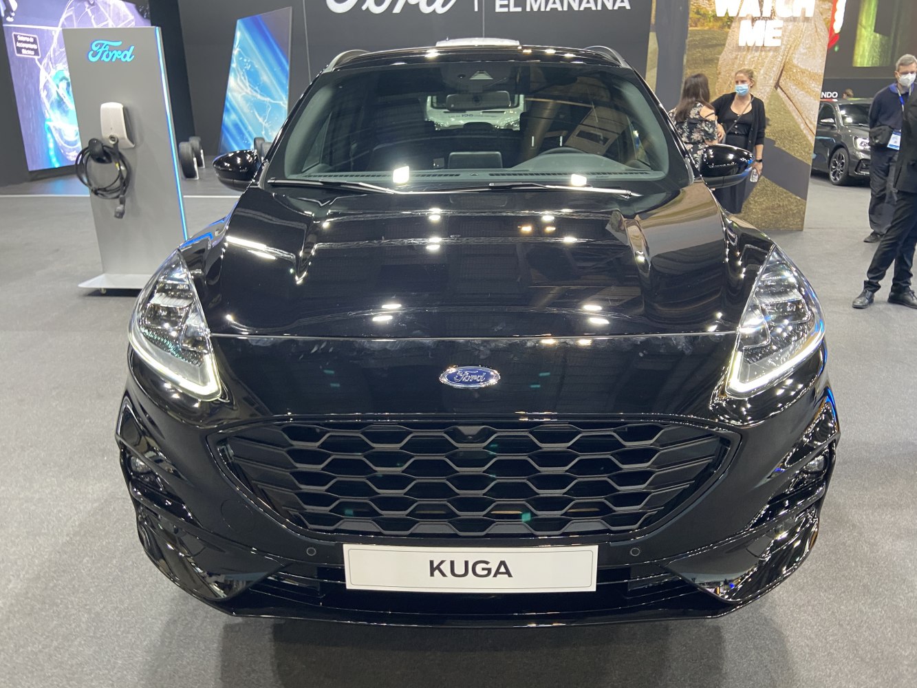 Front view with hexagonal grille and LED headlights.