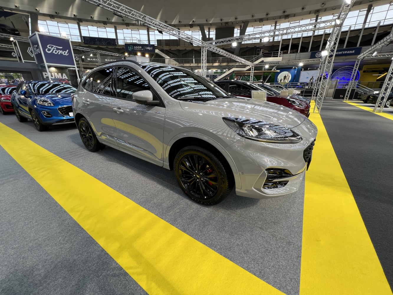 Front side view with LED headlights and black alloy wheels