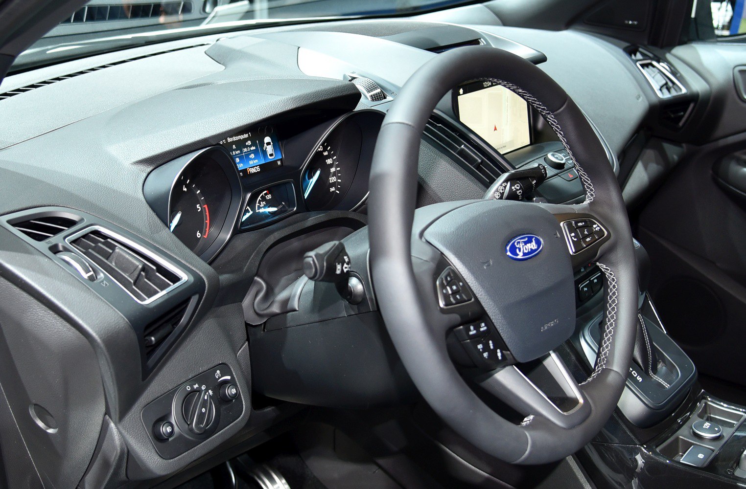 Dashboard and multifunction steering wheel with digital displays and control buttons