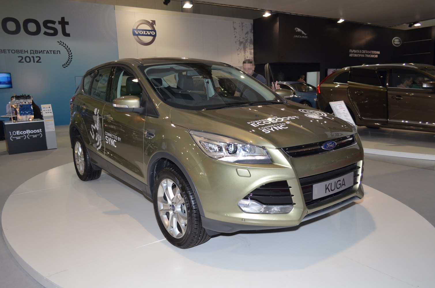 Front and side view of an SUV with EcoBoost and SYNC badges