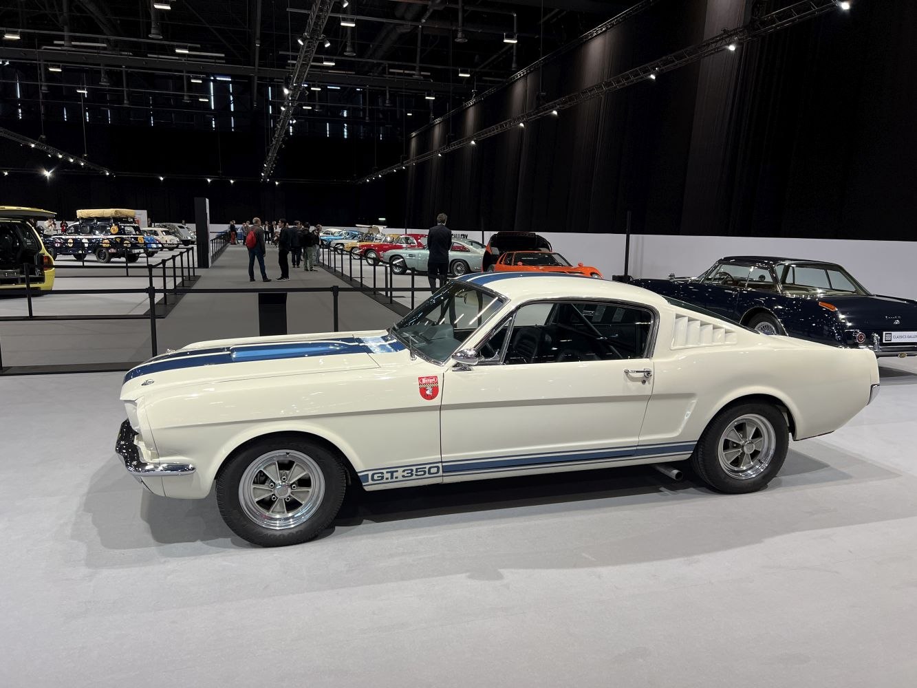 Vintage muscle coupe with GT350 striping and vented fastback profile