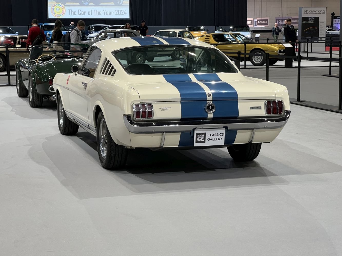 Rear view of Shelby I with blue racing stripes and classic taillights