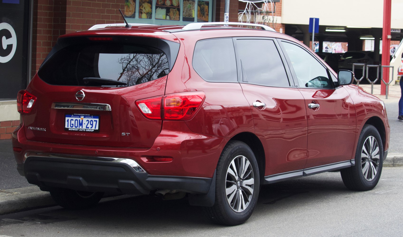 Rear and side view showing taillights and wheels