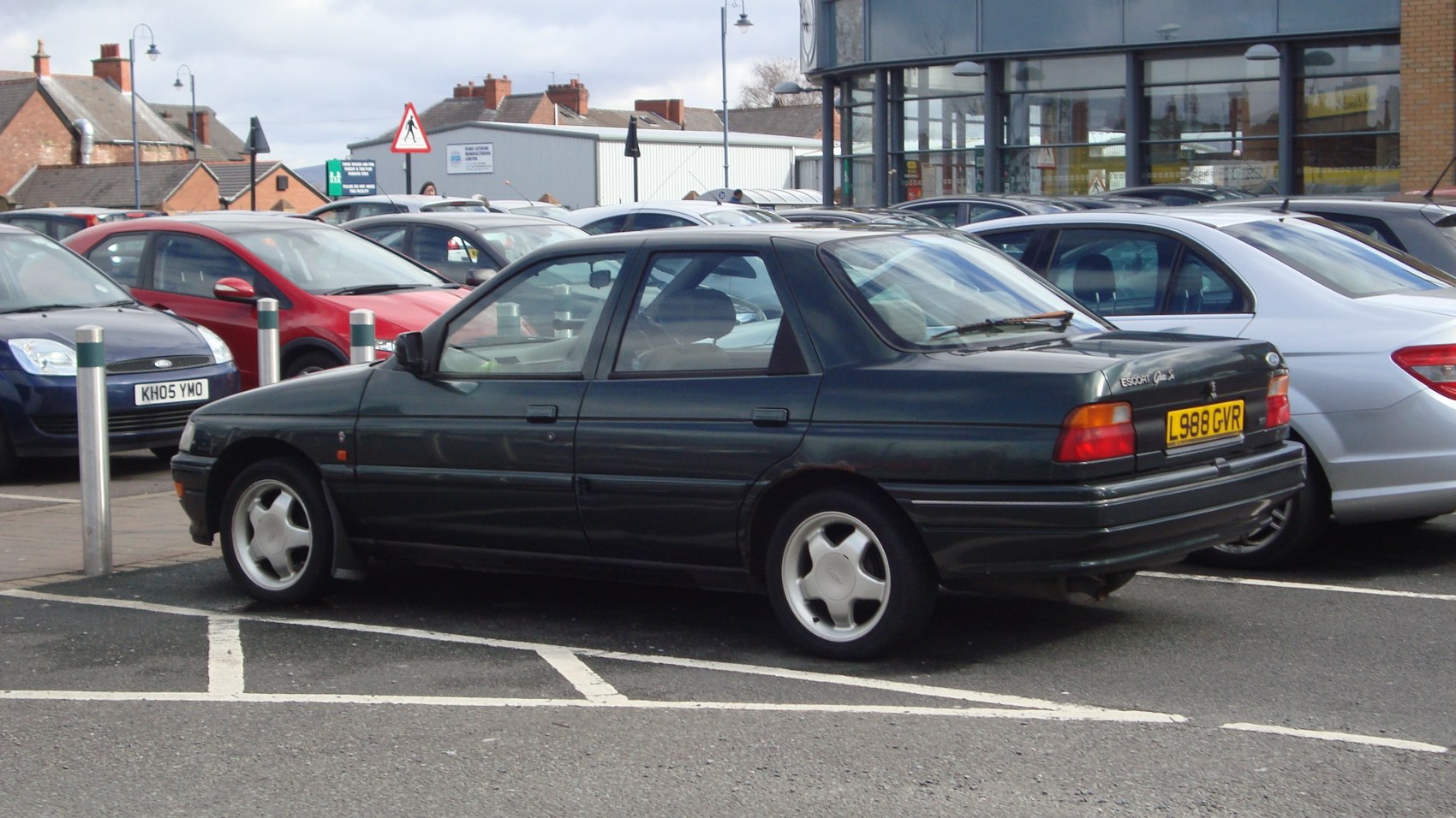 Sedan rear side view with distinct 1990s design elements