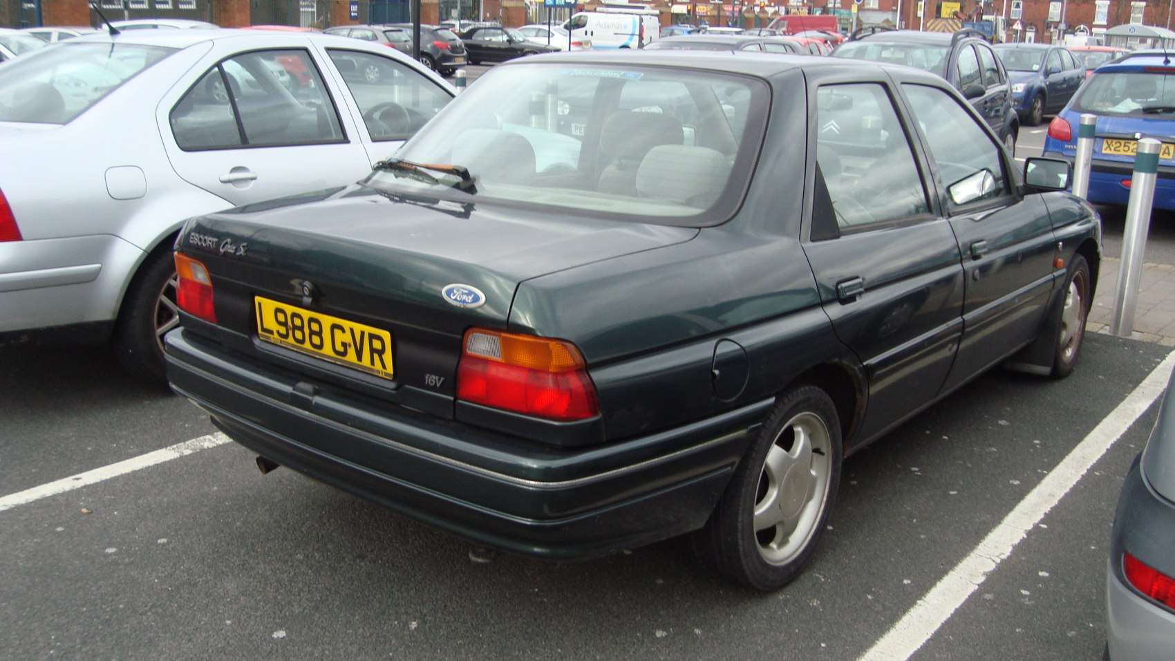 Rear view with classic tail lights and 16V badge