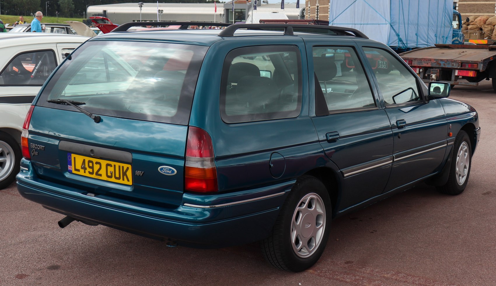 Rear side view of station wagon with rear wiper and distinctive tail lights