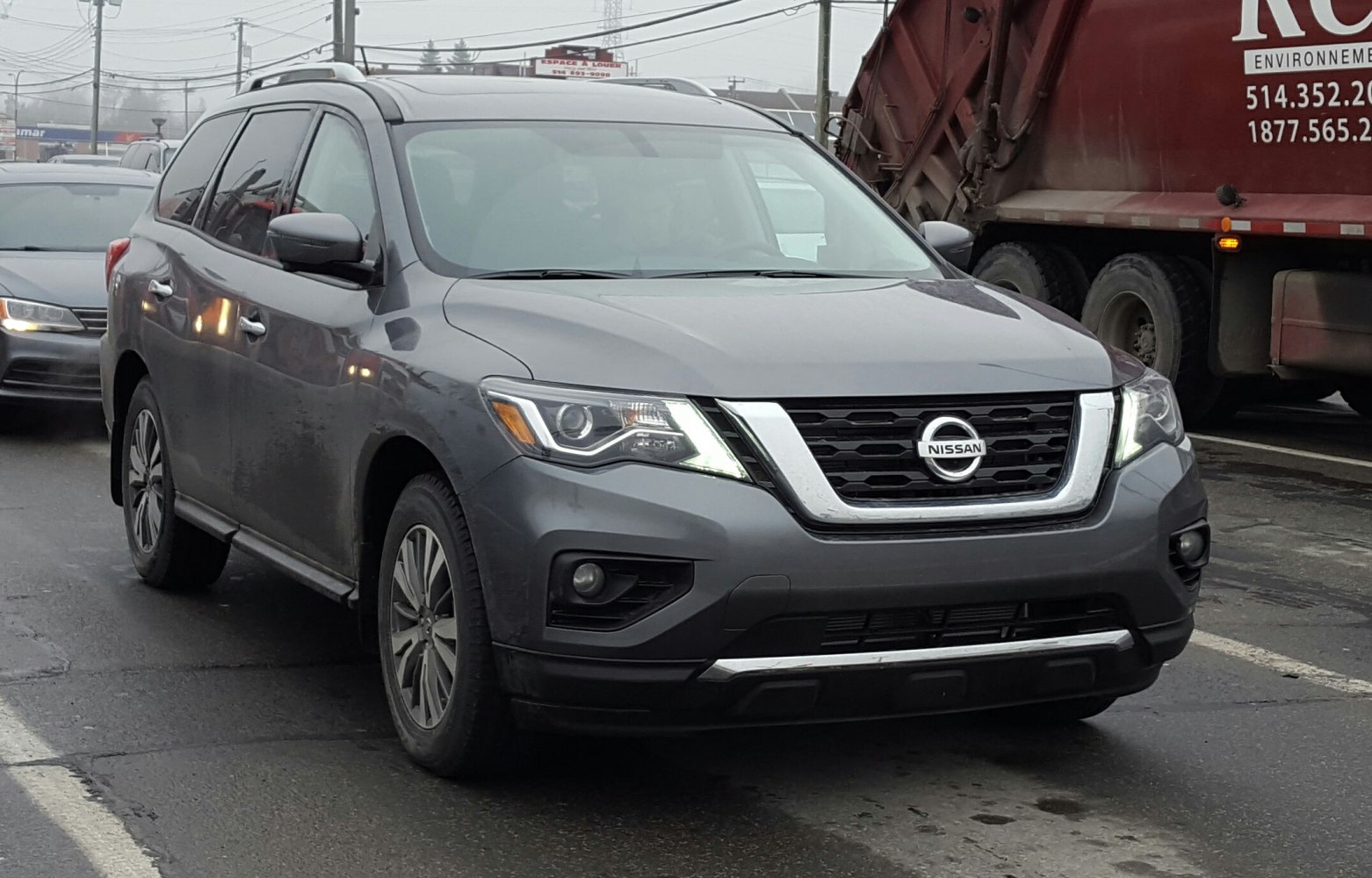 Front view of SUV with LED headlights and chrome grille