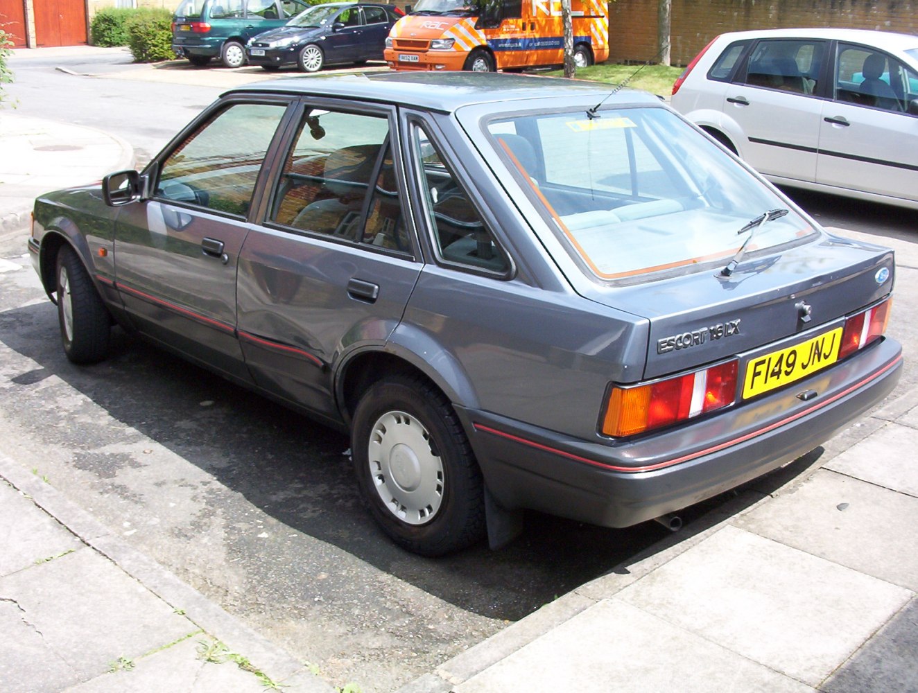 Rear side hatchback view with tail lights and five-door layout