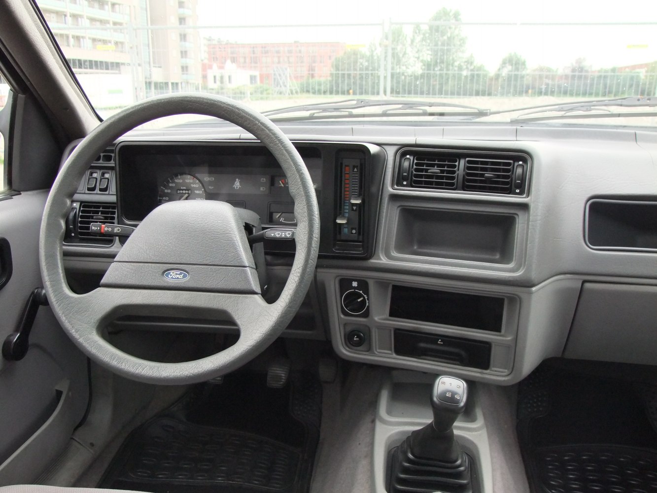 Vintage dashboard and manual gear shift with steering wheel