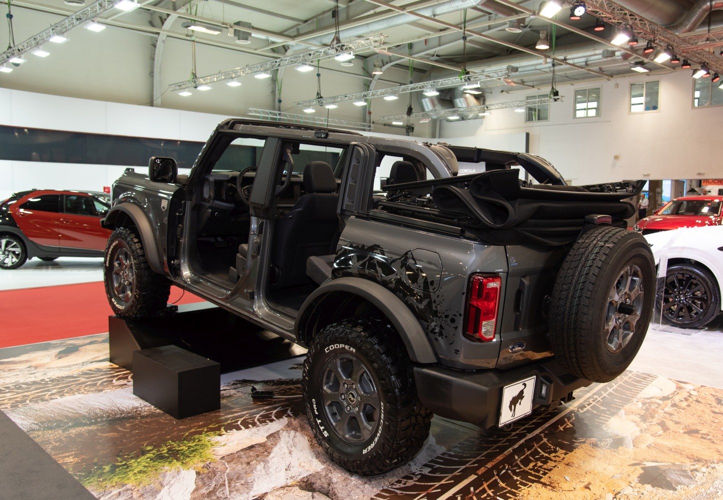 SUV with rugged off-road tires and removable soft top