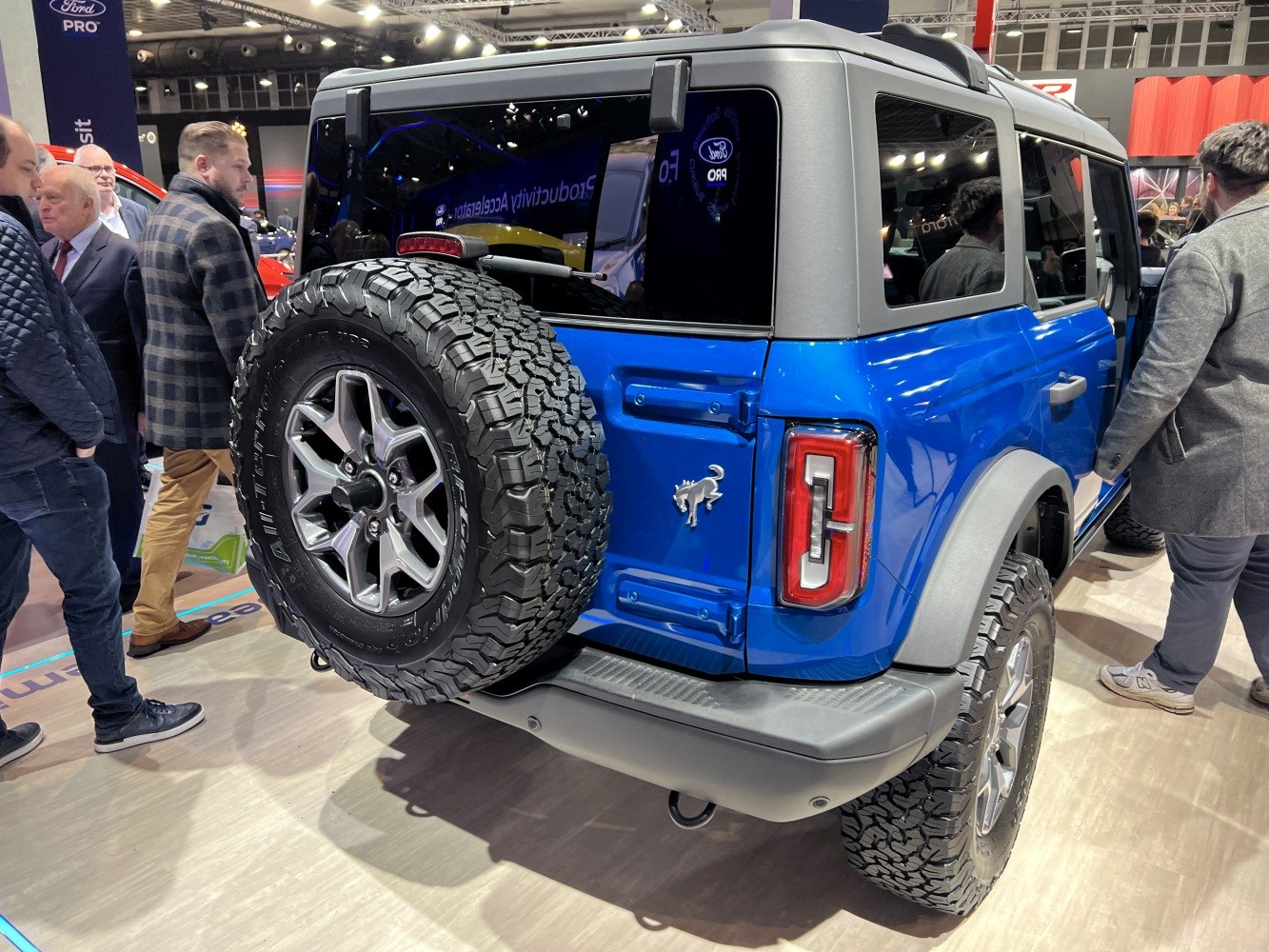Rear view with spare tire and distinctive rear lights of an SUV