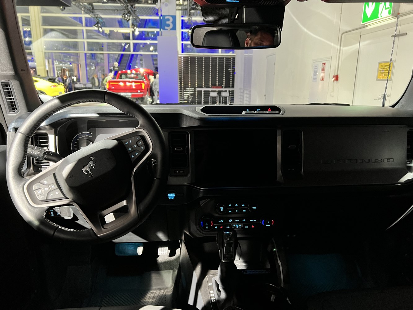 Steering wheel with multifunction controls and modern dashboard layout