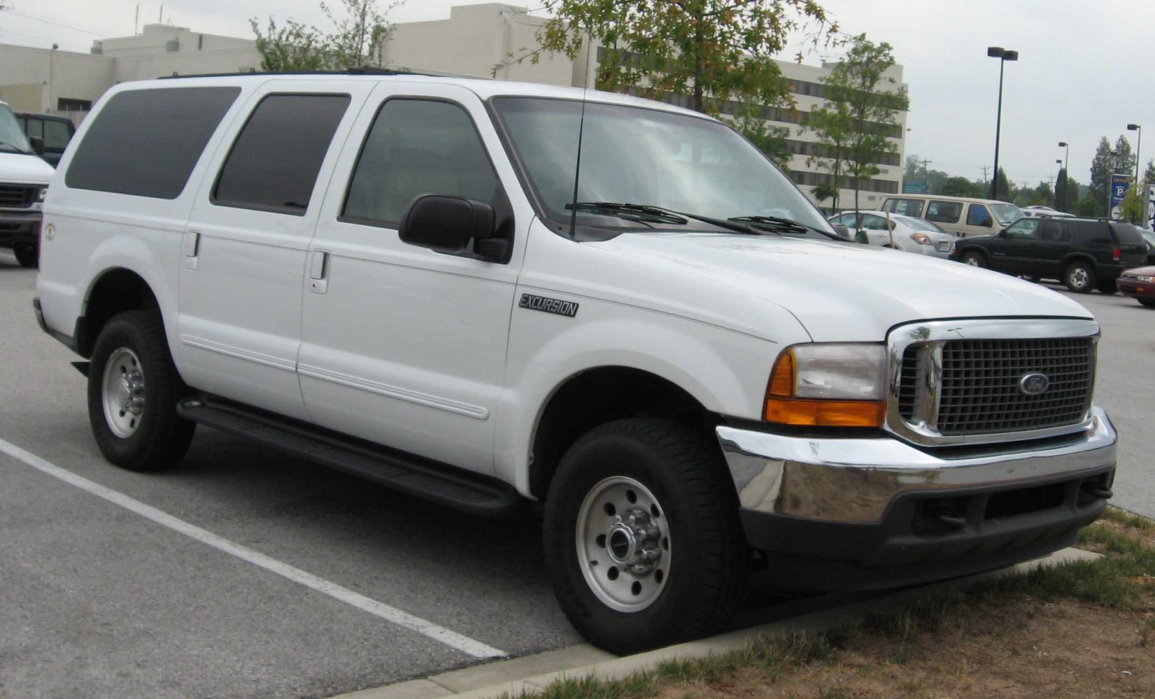 Full-size SUV with chrome grille and black running boards