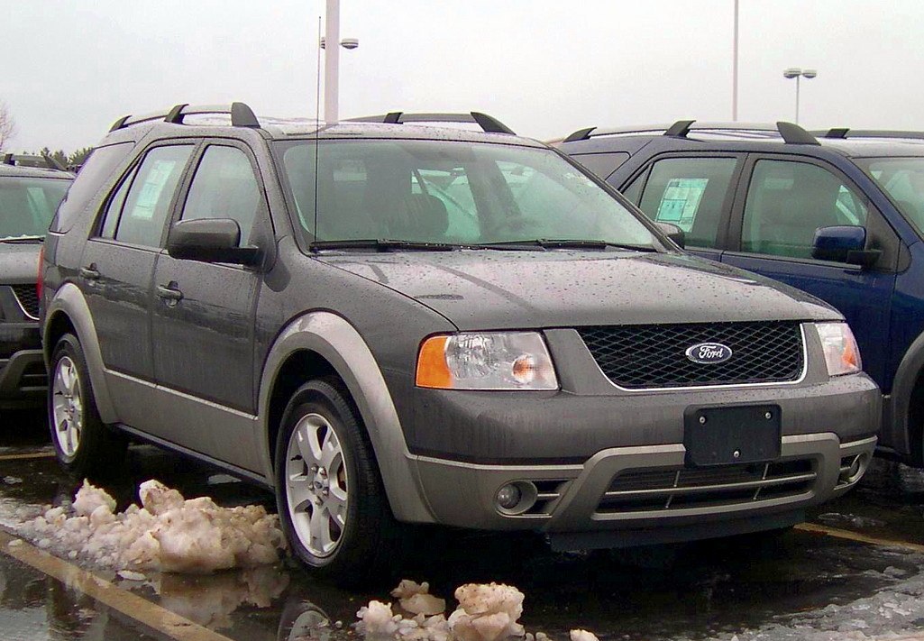 Rugged SUV with roof rails and dual-tone bumper front side view