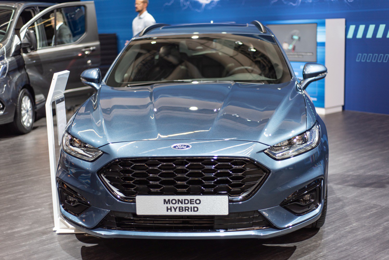 Front view with honeycomb grille and sleek headlights