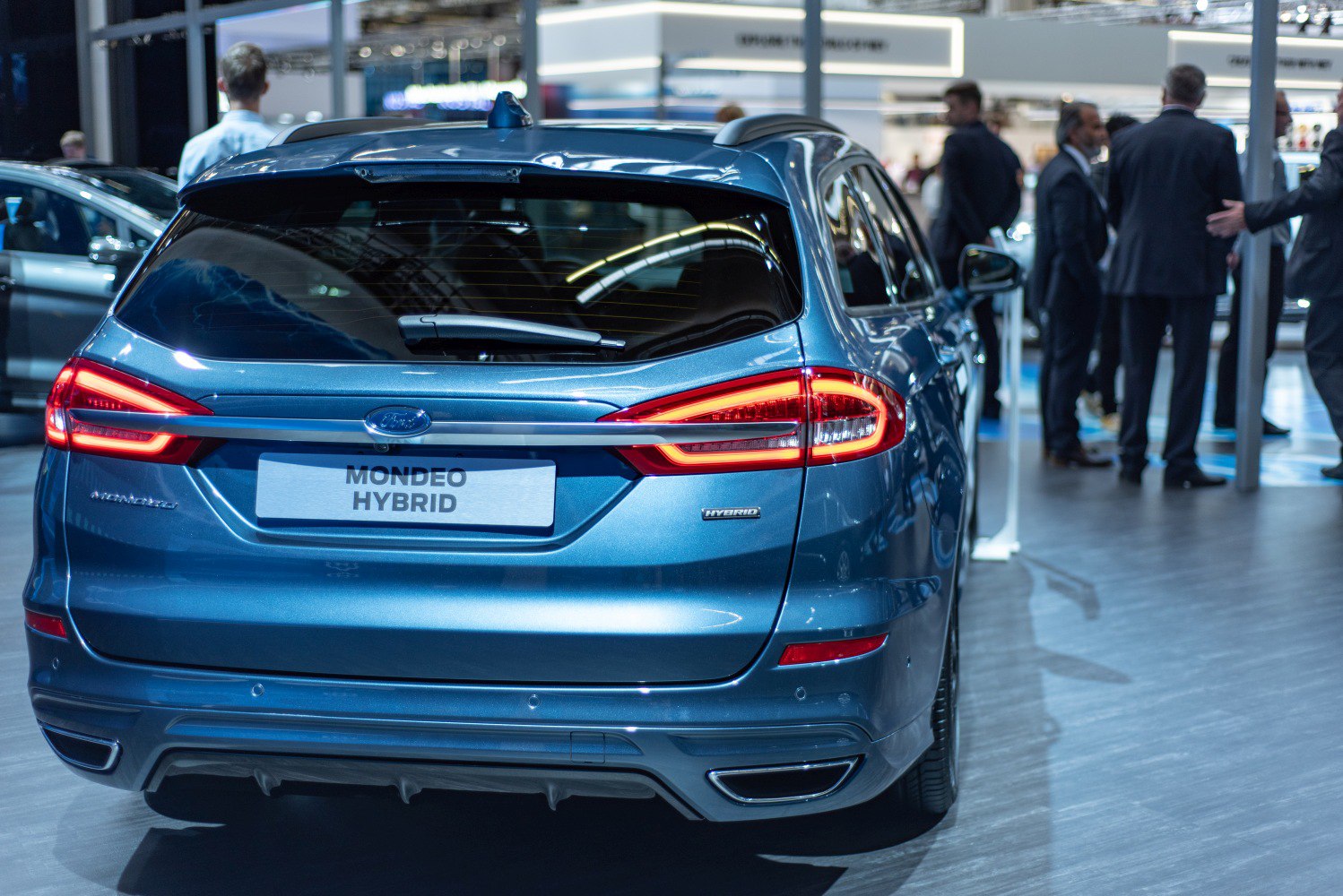 Rear view of hybrid wagon with LED tail lights and dual exhaust outlets