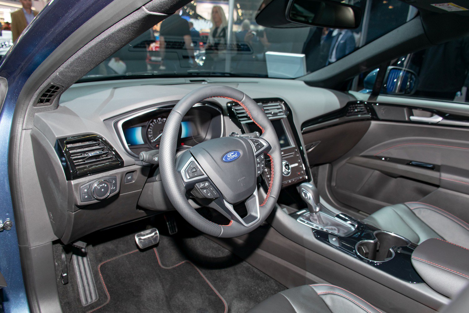 Steering wheel and dashboard with modern interior features and automatic gear shift