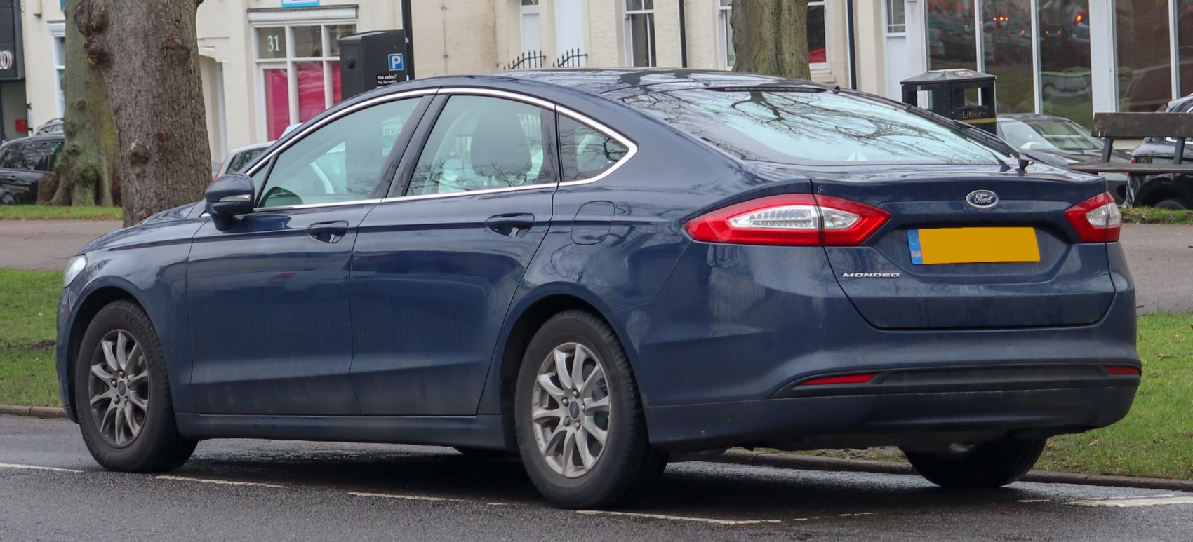 Rear and side view with taillights and alloy wheels