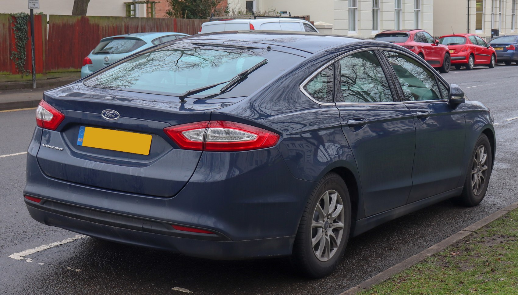 Rear view of hatchback with distinct tail lights and wiper