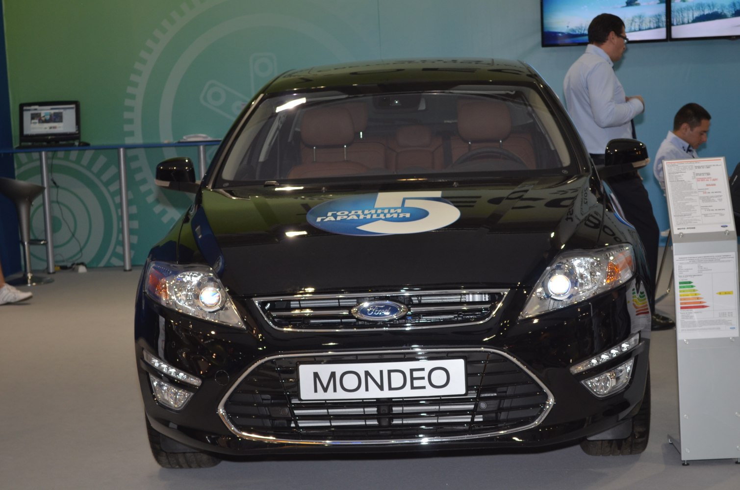 Front view with grille and headlights of facelifted hatchback