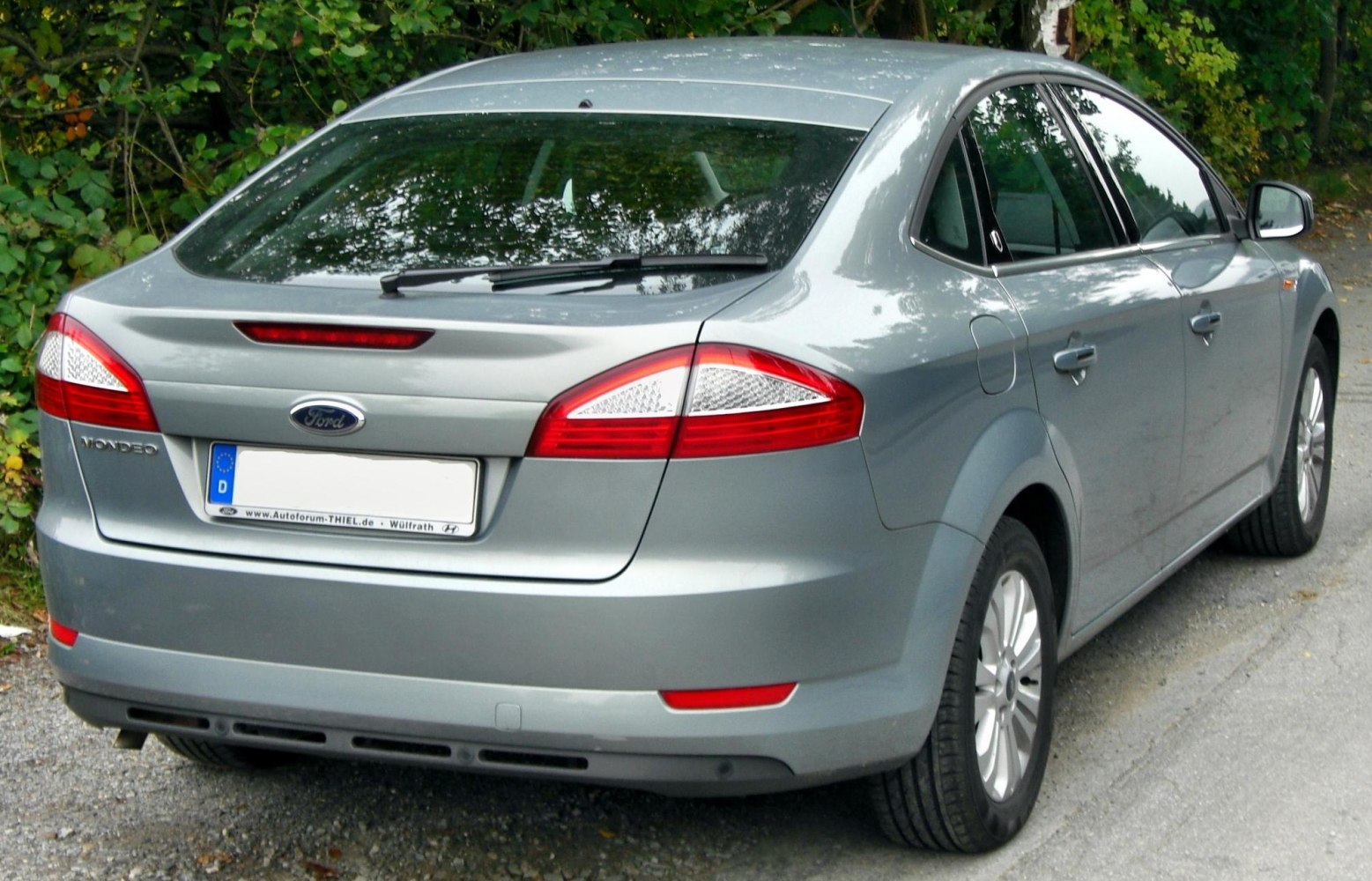 Silver hatchback rear with sleek taillights and rear wiper