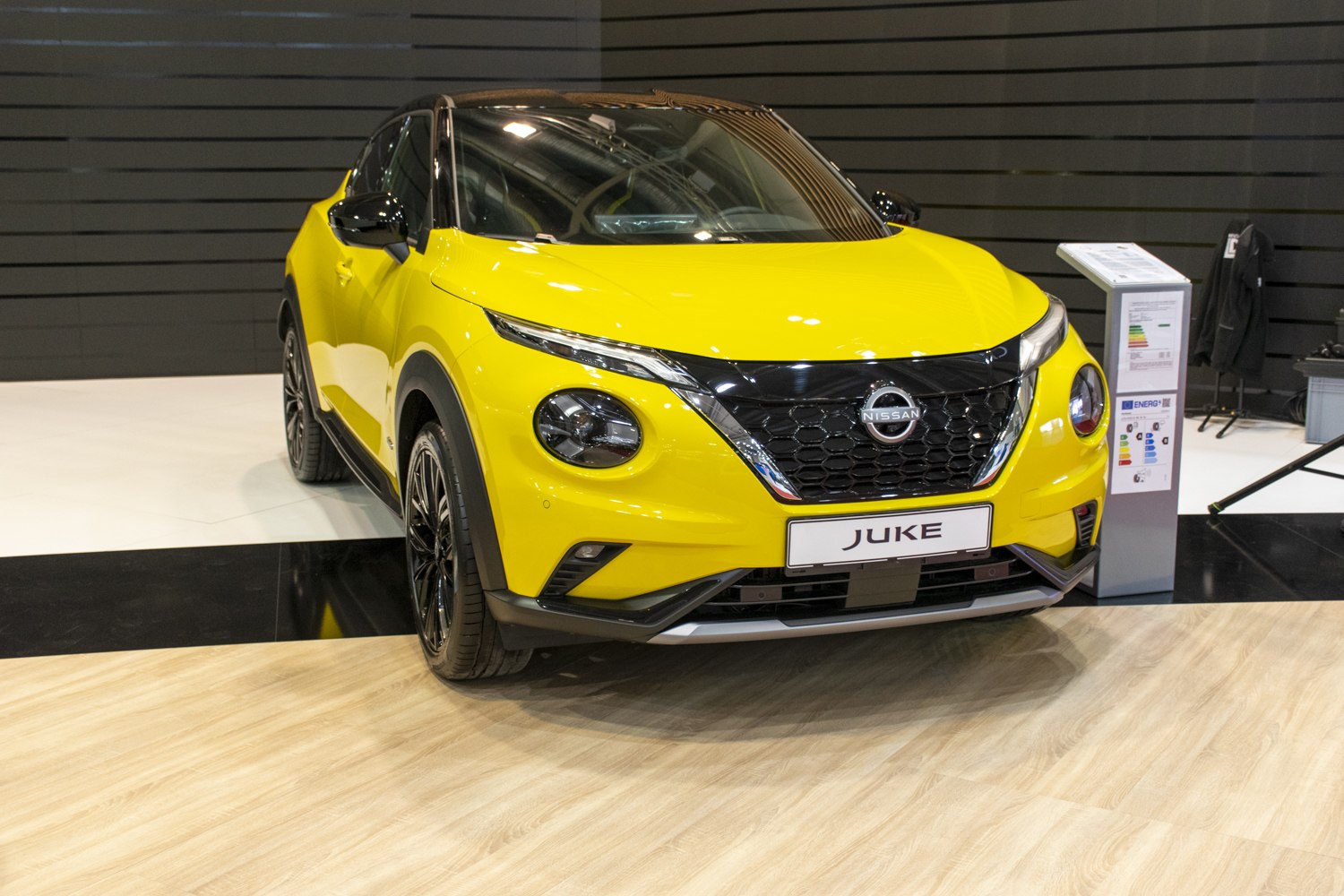 Yellow compact SUV with modern grille and round headlights