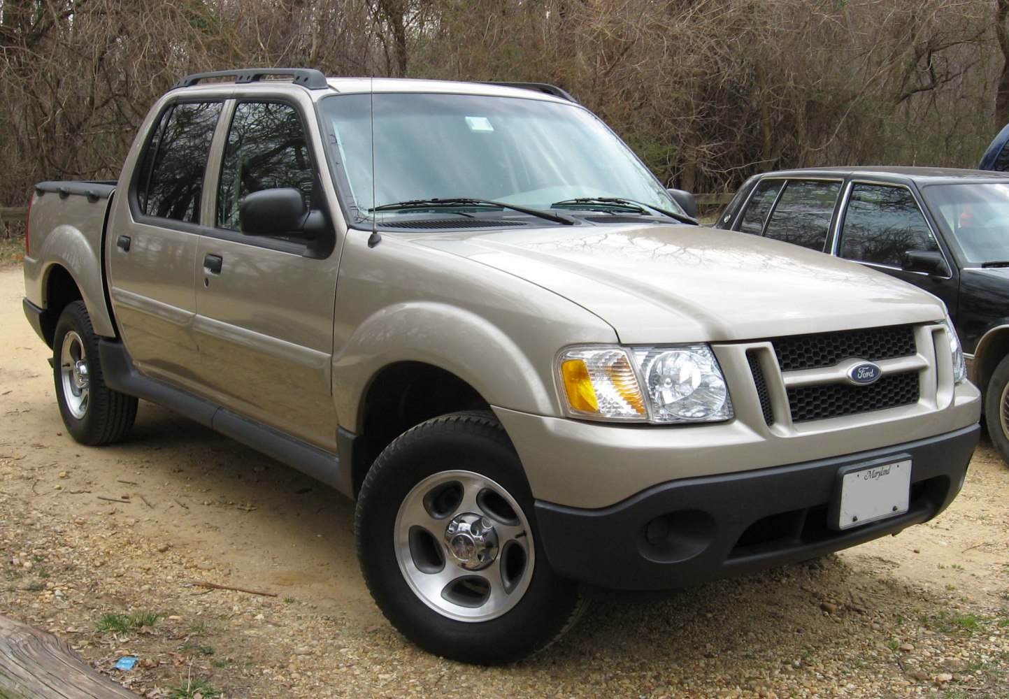 Pickup truck with crew cab and off-road tires