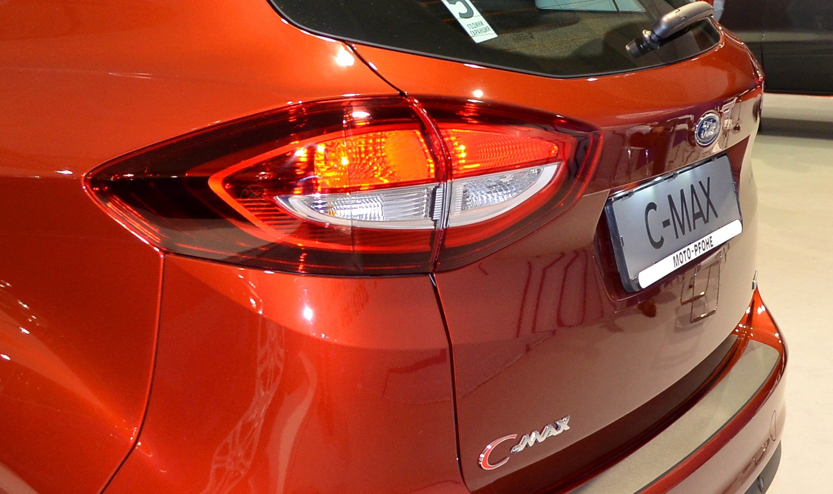 Rear light and tailgate badge detail of a hatchback