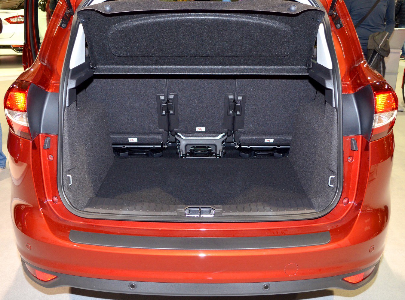 Spacious open trunk with foldable rear seats and carpeted interior