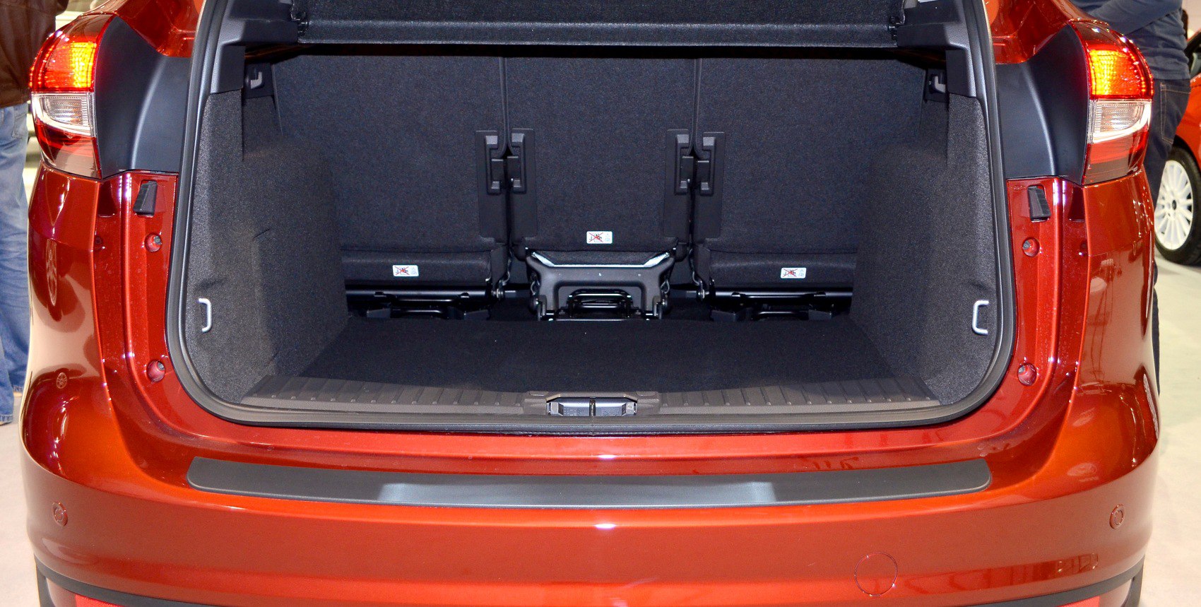 Spacious rear trunk interior with foldable seats and ample cargo room