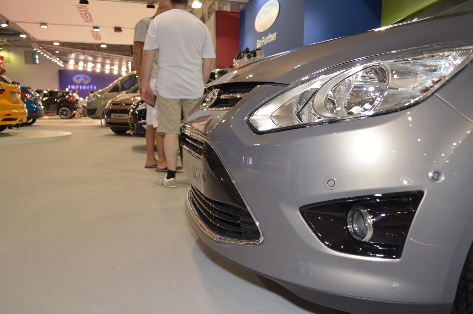 Close-up of modern MPV front fascia with headlight and fog lamp
